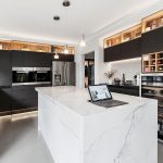 detail of sink in a modern bathroom renovation by High Level Renovations